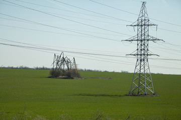 High-voltage transmission power tower with damaged structure