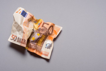 Obraz na płótnie Canvas сrumpled fifty euros, banknote,