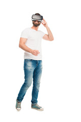 'Portrait of handsome bearded man using virtual reality headset, isolated on white