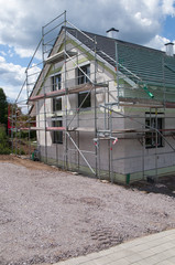 Fototapeta na wymiar Construction site of a small family house