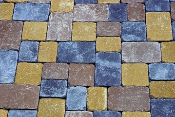 цветная текстура из фрагмента тротуарных кирпичей на дороге