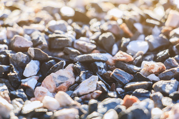 Close up texture of gravel stone ; selective focus (vintage style)