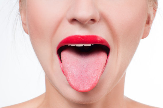 Female Tongue And Red Painted Lips
