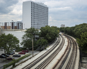 Fototapeta premium Tall building with tracks