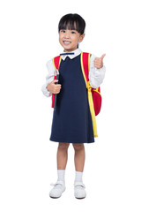 Asian Little Chinese girl in school uniform with school bag