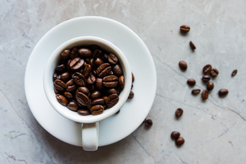 White Cup Filled With a Brown Coffee Beans