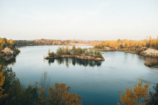Norwegian summer landscape with small island on a lake