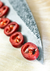Hot pepper, chili peppers, capsicum, knife