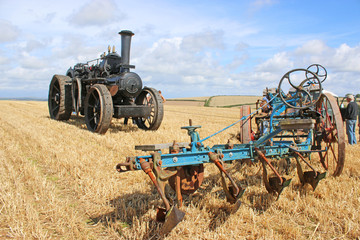 Steam traction engine with vintage plough