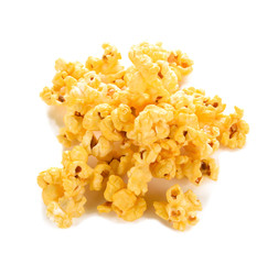Pieces of caramel popcorn on a white background