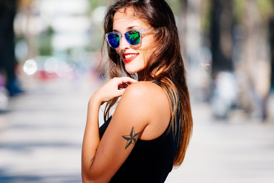 Portrait of beautiful woman with sunglasses
