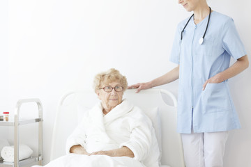 Obraz premium Young doctor in blue uniform