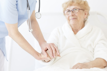 Obraz premium Doctor in blue uniform and with stethoscope