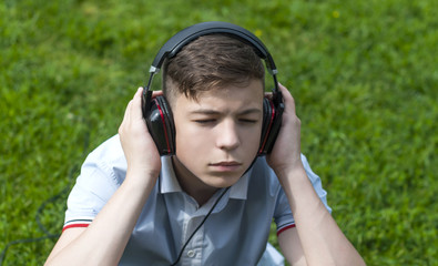 Young man with headphones listening to music