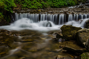 Landscape of waterfall Shypit in the Ukrainian Carpathian Mountains on the long exposure