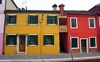 Colored facades of houses on the island of Burano, Italy