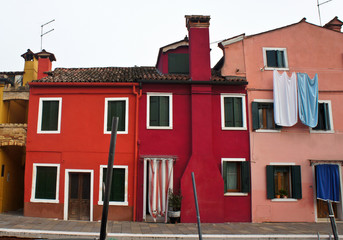 Colored paint facades of houses on the island of Burano, Italy