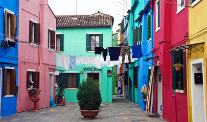 Fototapeta na wymiar Courtyard between houses on the island of Burano, Italy