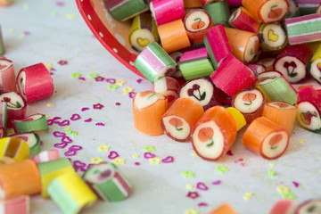 Funny colorful sweets with different fruits 