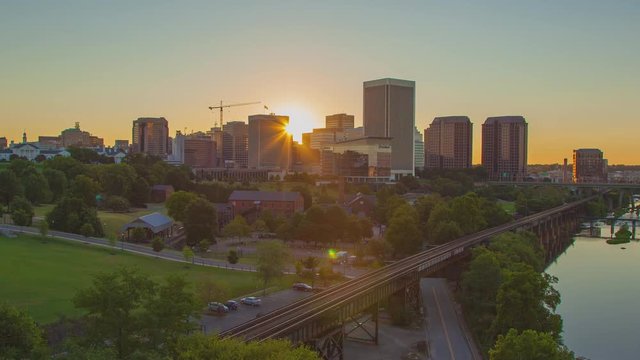 Richmond VA City Skyline Daybreak Timelapse at Dawn with the Sun Rising from Behind the Virginia Capital City Buildings
