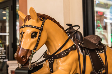 Rocking horse amusement attraction