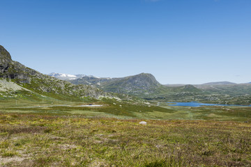 Fototapeta na wymiar mountains in norway with blue sky background