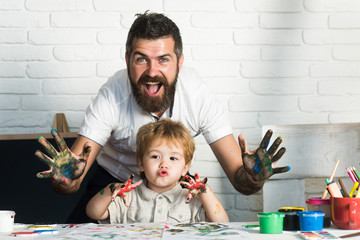 Joy family art, happy father and son show hands in bright colors, paint together picture, art for...