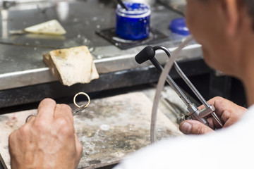 Hand-made wedding ring by goldsmith craftsman