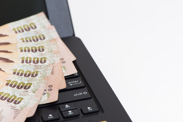 The group of cash on laptop, the business finance and computer technology concept