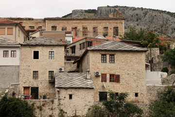 Fototapeta na wymiar Old stone buildings near Old bridge in Mostar , Bosnia and Herzegovina