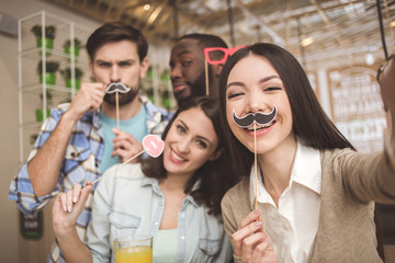 Students in the cafe study together education concept