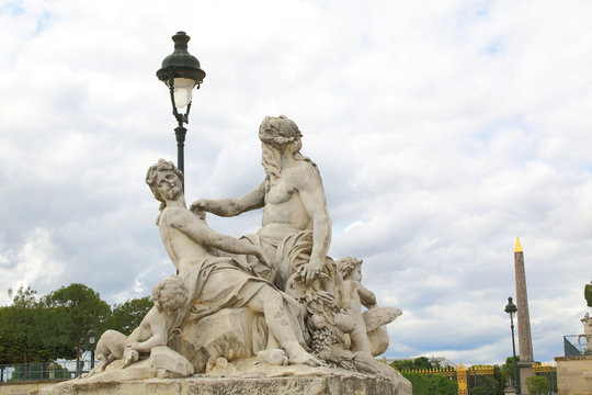 The statue Le Tibre in Tuileries Garden in Paris
