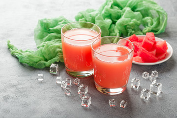 Two bottles of watermelon juice