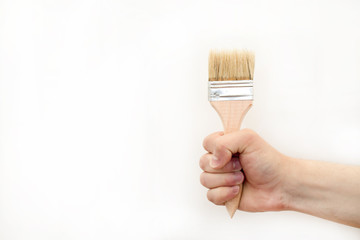 Building brush in hand