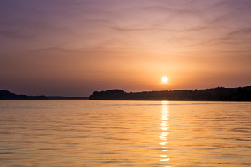Fototapeta na wymiar Beautiful abstract colorful sunset on the Danube river