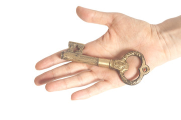 Beautiful woman hand with an antique key