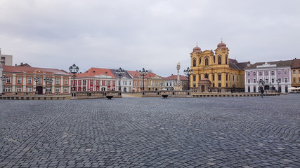 Timisoara, Romania - February 3rd 2017: Unirii square with the cathedral in the background