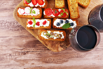 Bread Brushetta or authentic traditional spanish tapas set for lunch table. Sharing antipasti on...