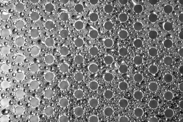 texture of metal circular hole plate and dew drop