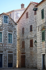 Fototapeta na wymiar A street in Old Town in Stari Grad, Croatia 