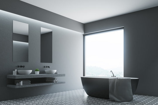 Gray bathroom, round tub, poster corner