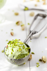 Pistachio ice cream with crushed pistachios closeup - 167516825