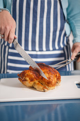 Slicing Chicken on cutting board