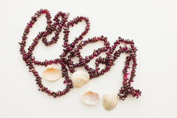Garnet thread and four shells