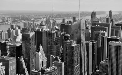 The skyline of midtown New York City and Times Square in black and white.
