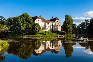 Fototapeta na wymiar Jaunpils Castle is a fortified castle in the historical region of Zemgale, in Latvia