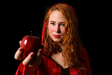Little Red Riding Hood with an apple