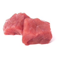 Raw chopped beef meat pieces isolated om white background cut out.