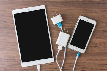 charger cables connect with smartphone and tablet