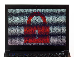 Red lock over encrypted text on a laptop screen against a white background